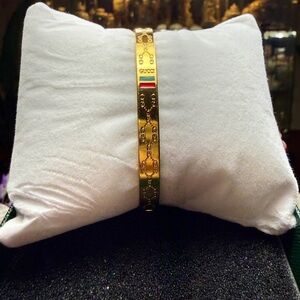 Gold Bracelet with Red and Green Accents